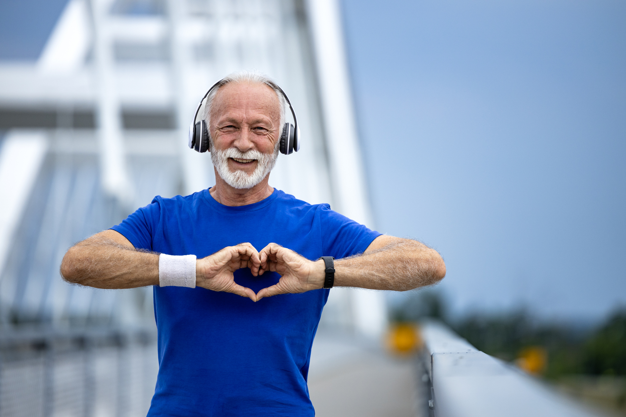 Senior adult man promoting healthy lifestyle with walking.